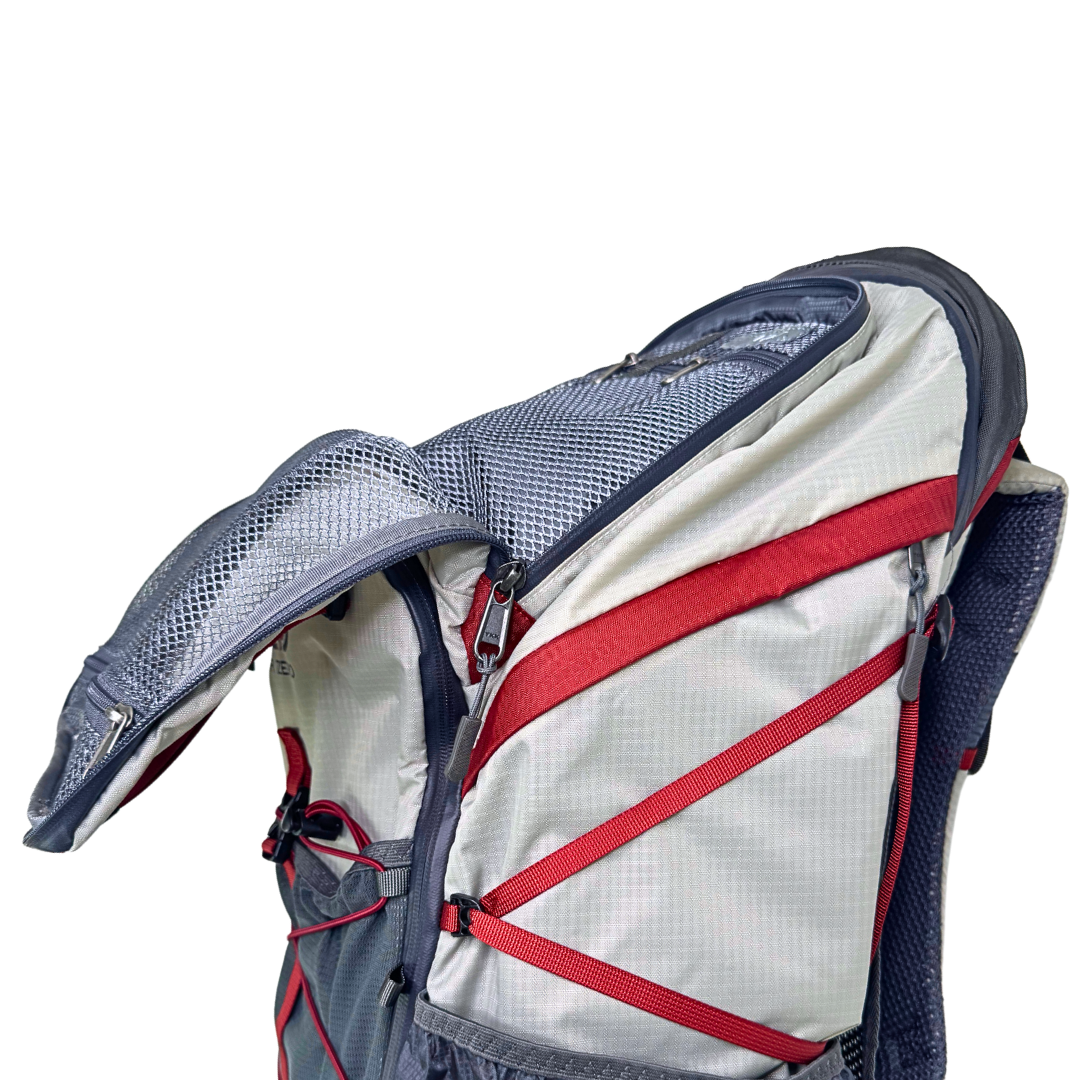 Dean 60L Backpack with red straps on a white background