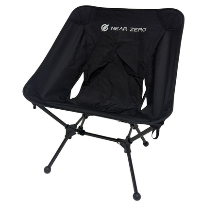Black camping chair with 'Near Zero' logo on a white background